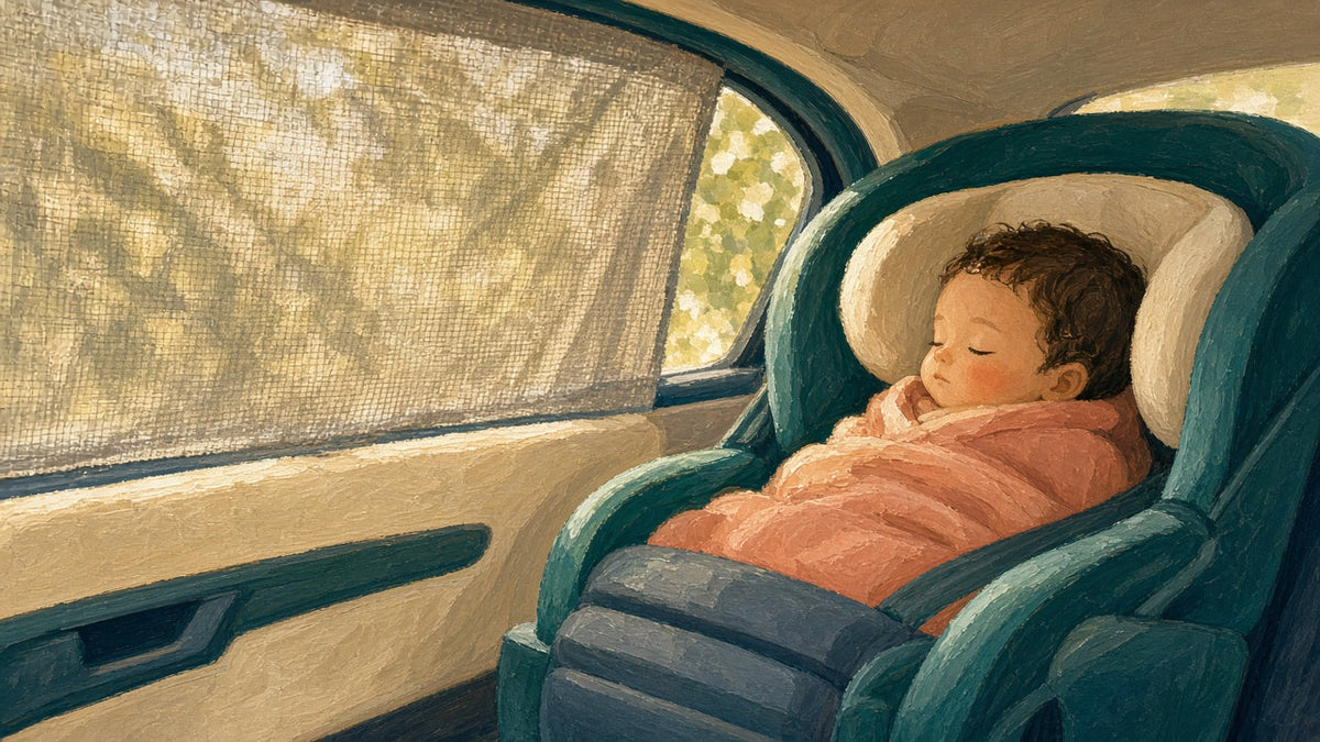 Baby asleep in a car seat beside a mesh window sun shade
